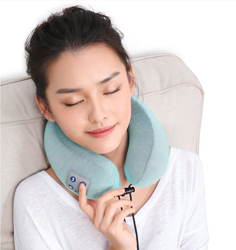 Office worker using neck massager